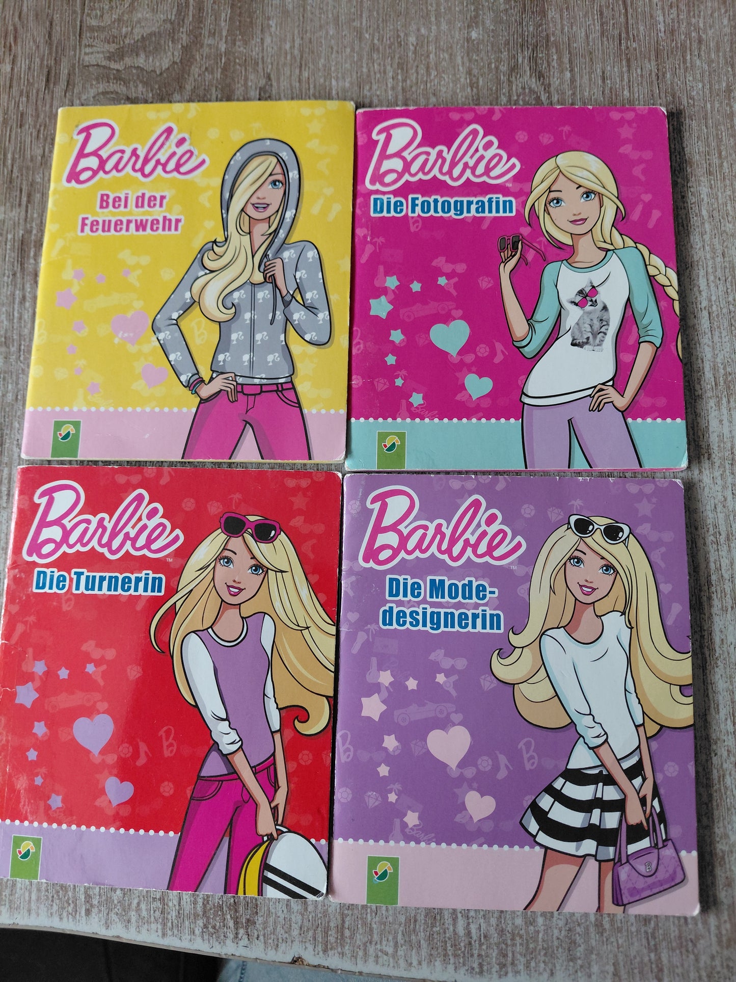 Barbie bei der Feuerwehr Barbie Die Fotografin Barbie Die Turnerin Barbie Die Modedesignerin