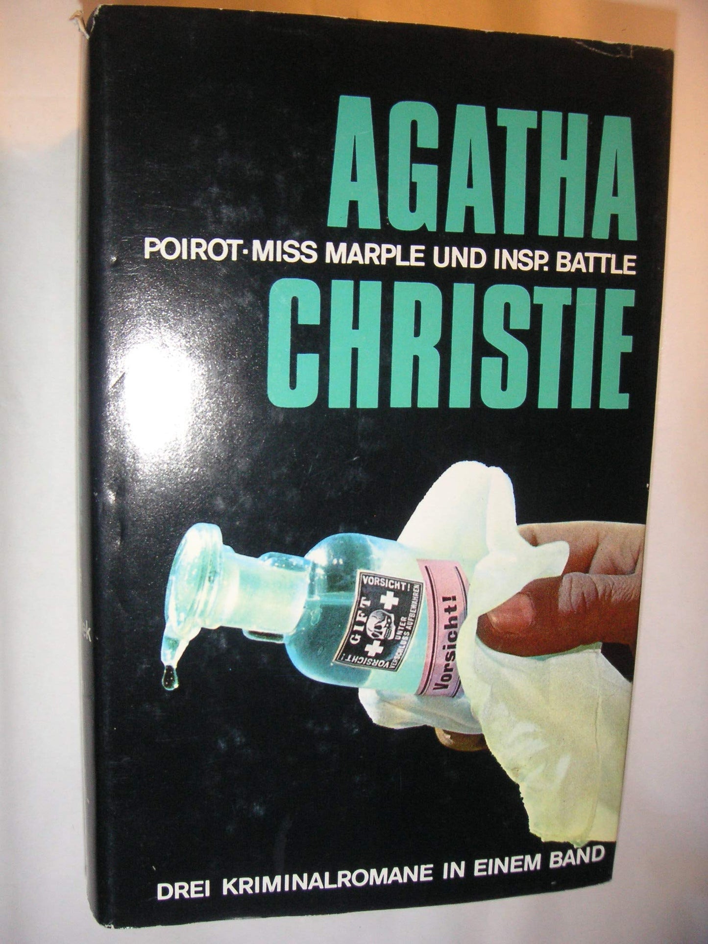 Poirot, Miss Marple und Insp. Battle - Drei Kriminalromane in einem Band - Die Tote in der Bibliothek, Mit offenen Karten und Der Wachsblumenstrauss.
