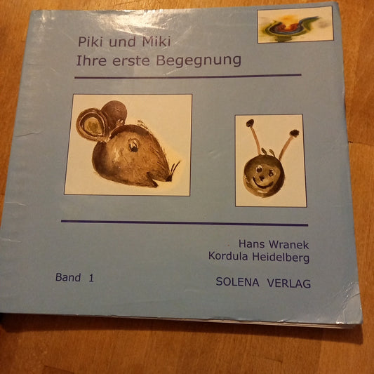 Piki und Miki Ihre erste Begegnung