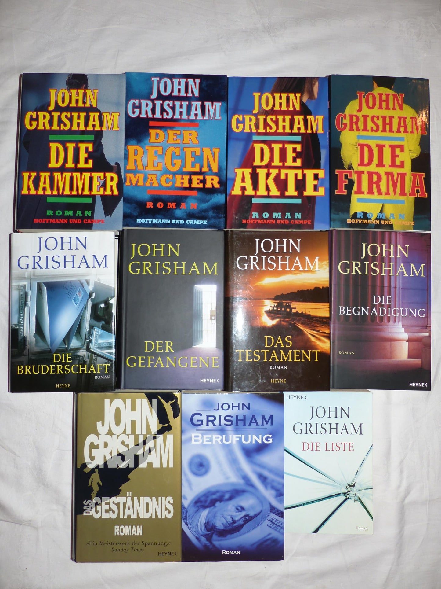 10 x John Grisham : 1. Der Regenmacher , 2. Die Bruderschaft , 3. Die Kammer , 4. Der Klient , 5. Berufung , 6. Der Richter , 7. Anklage , 8. Der Gefangene , 9. Die Schuld , 10. Die Farm