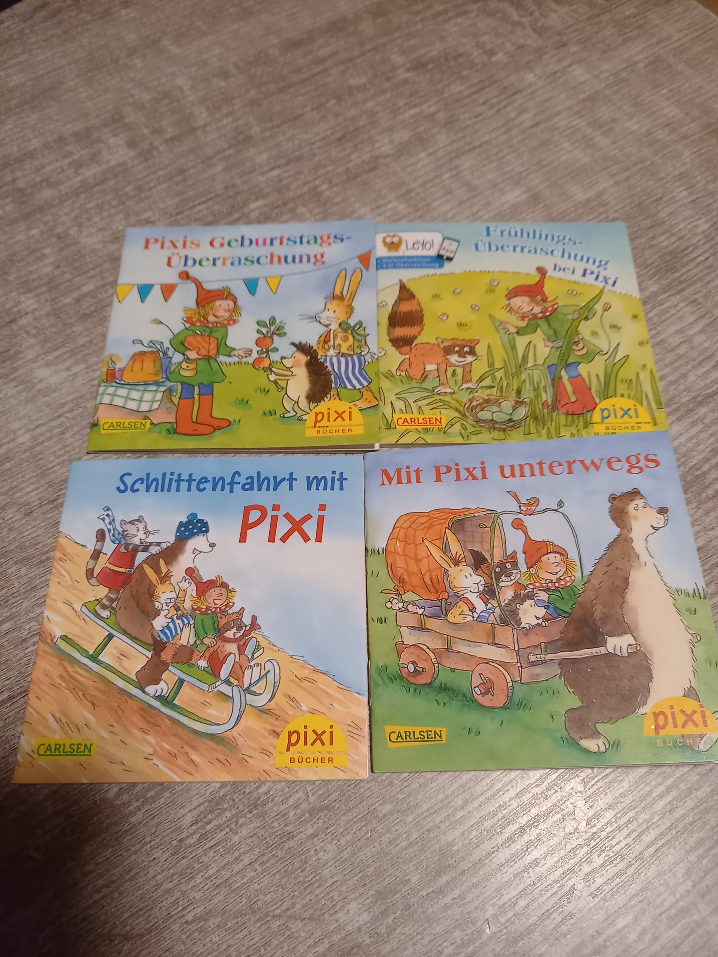 4x Pixi   1  Pixis Geburtstagsüberraschung  2 Frühlingsüberraschung bei Pixi    3 Schlittenfahrt mit Pixi    4  Mit Pixi unterwegs