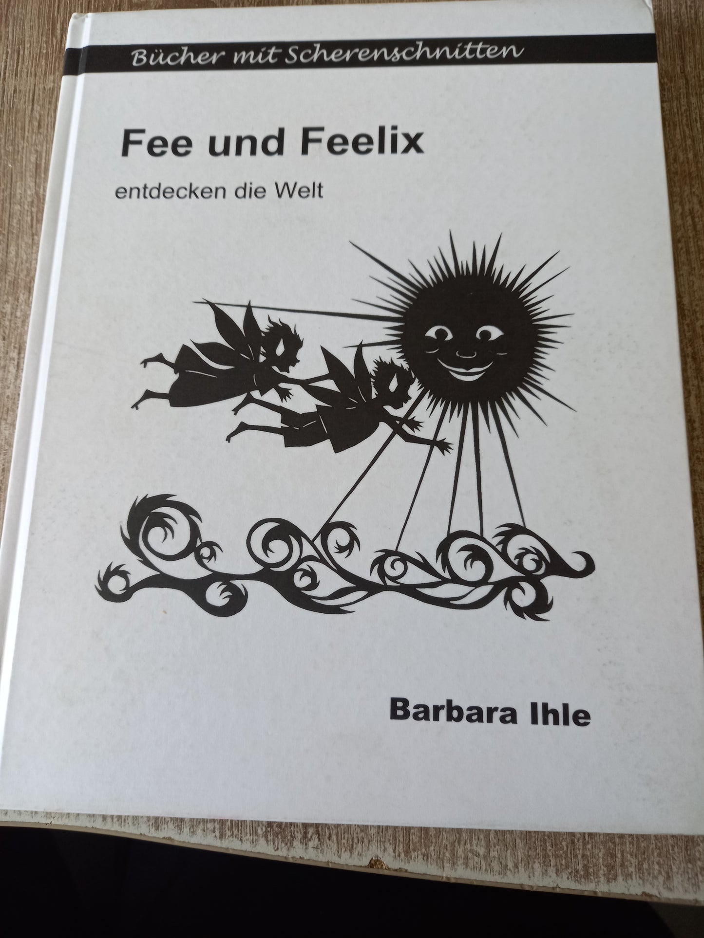 Bücher mit Scherenschnitten Fee und Feelix entdecken die Welt von Ihle
