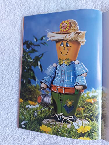 TonTopfTräume: Lustige Ideen aus Tontöpfen mit Holzteilen und Farbe verziert